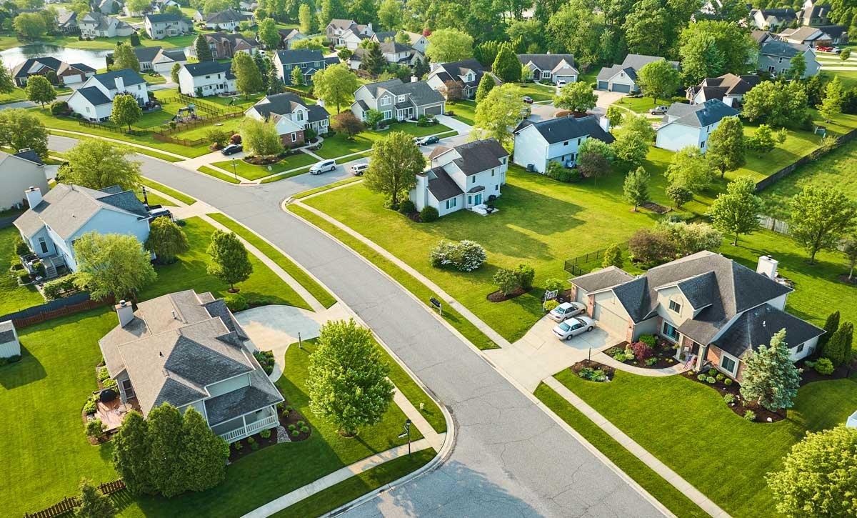 Drone photo of a neighborhood of large homes