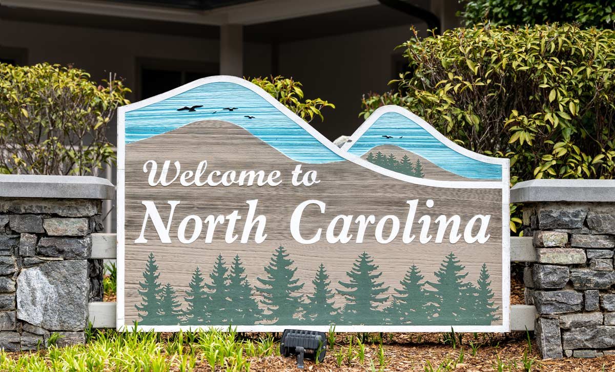 Rest stop on highway road in North Carolina with welcome sign